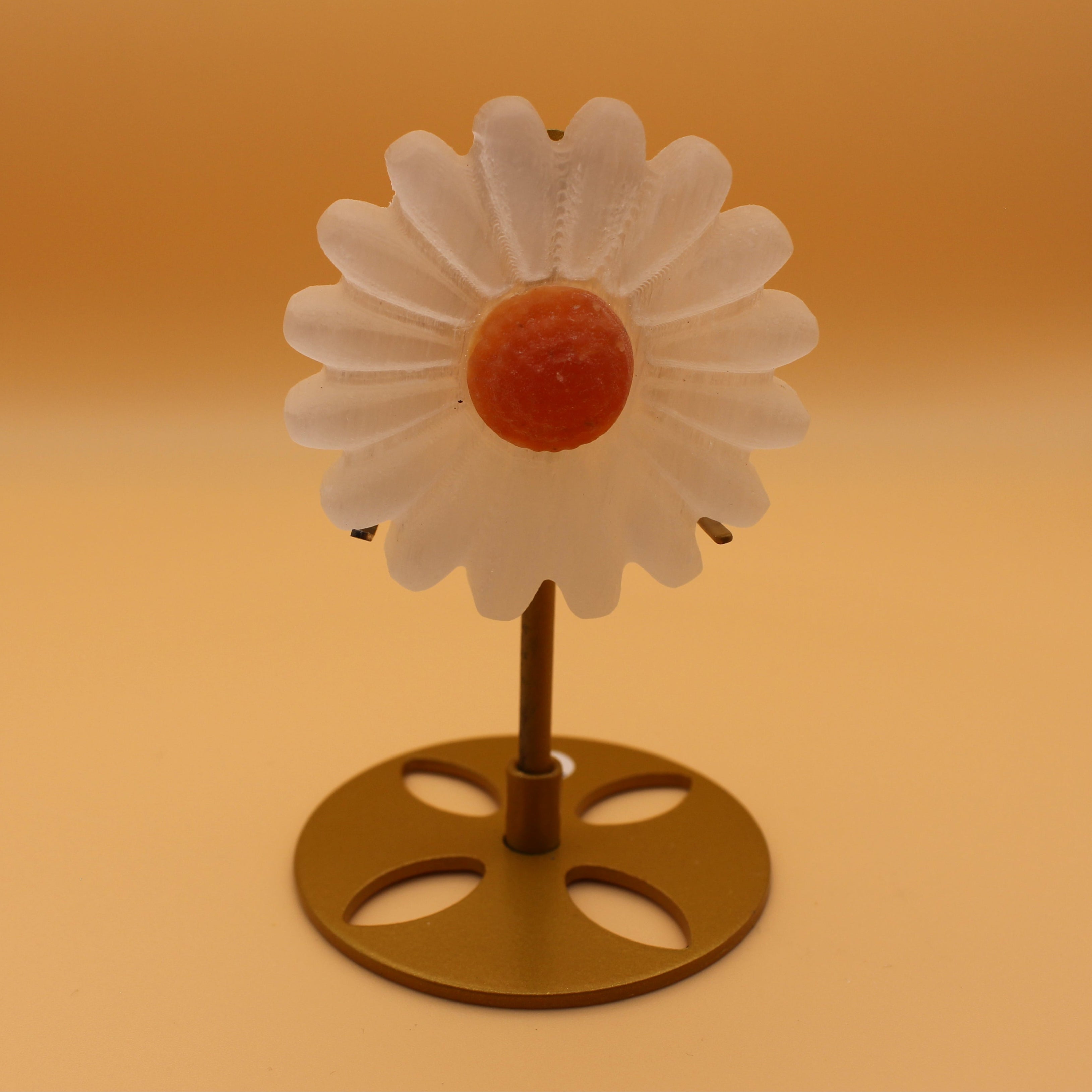 Selenite daisy with orange calcite – symbol of purity and joie de vivre